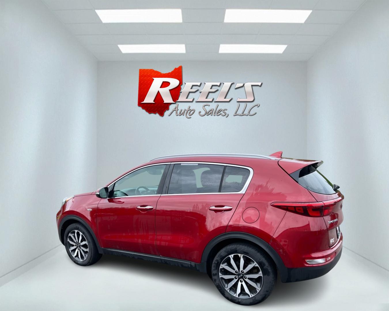 2018 Red /Gray Kia Sportage EX AWD (KNDPNCAC3J7) with an 2.4L I4 DOHC 24V engine, 6A transmission, located at 547 E. Main St., Orwell, OH, 44076, (440) 437-5893, 41.535435, -80.847855 - This 2018 Kia Sportage EX AWD is a well-rounded compact SUV that offers a good blend of capability and features. It comes equipped with a 2.4L I4 GDI engine paired with a 6-speed automatic transmission and AWD system with locking center differential. The driving experience is enhanced by features li - Photo#8